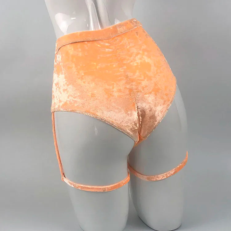 Prismatic Y2K-inspired peach velvet bodycon high-cut rave shorts with sculpting tech-fabric straps
