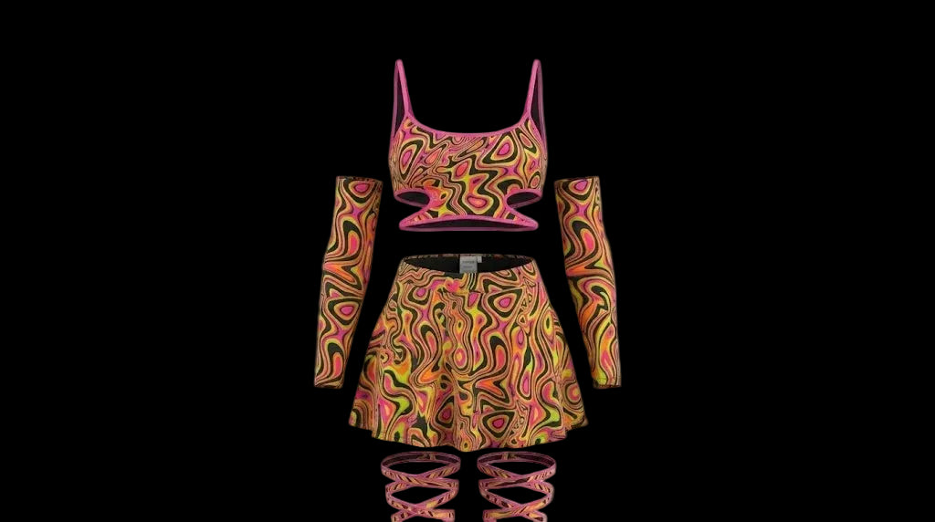 Colorful outfit set with top, skirt, and leggings on a gray background