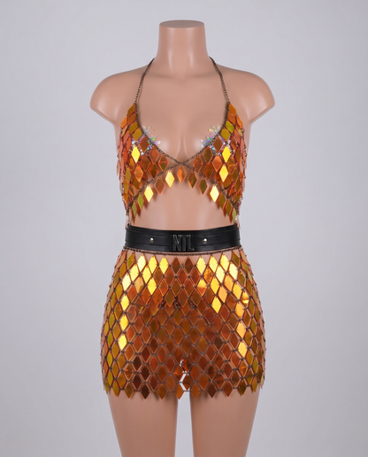 Holographic orange mirror crop top and skirt festival outfit on mannequin