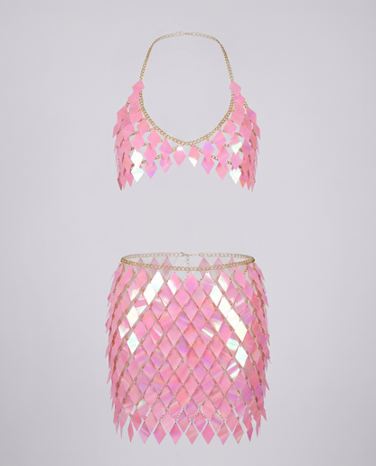Pink iridescent chain crop top and skirt set with diamond-shaped panels for festival wear