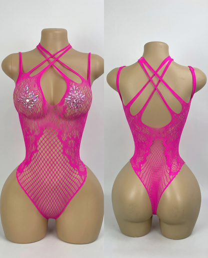 Hot pink mesh bodysuit with crystal accents and criss-cross straps, front and back views