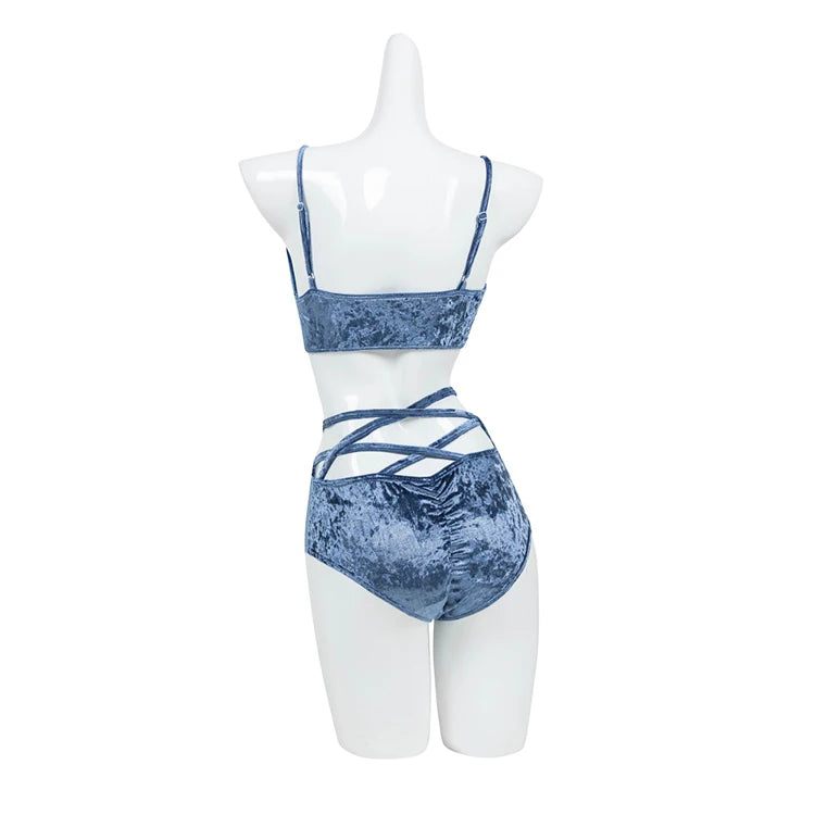 Back view of teal velvet sculpt set showing compression fit and halter neck.