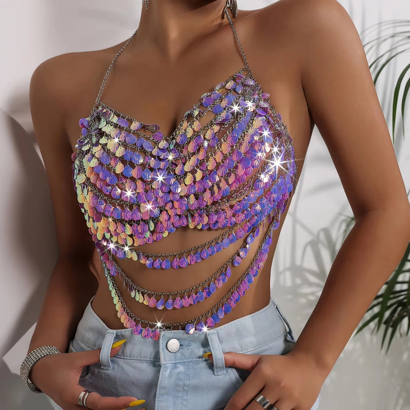 Y2K-inspired prismatic bodycon crop top with rhinestone-embellished high-refraction crystals, rave-ready.