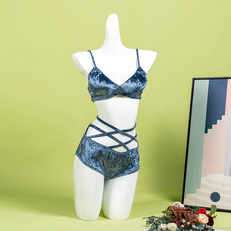 Cyber Teal velvet festival set with halter top and strap detail bottoms.