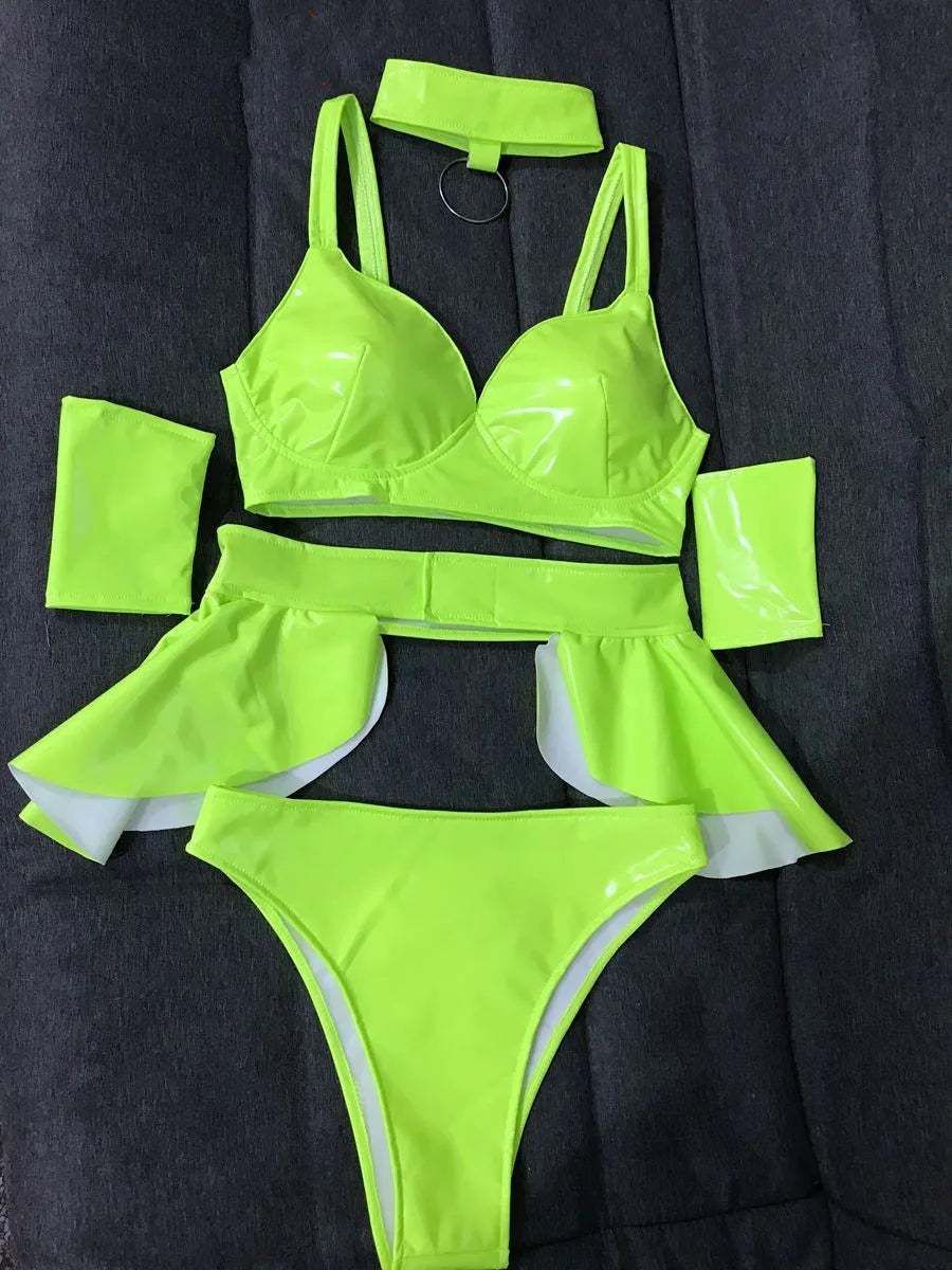 High vis green high-gloss rave outfit featuring moisture-wicking stretch fabric and a second-skin fit for high-intensity festival dancing."