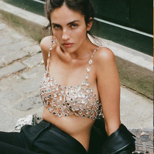 Rave-ready bodycon top with high-refraction crystals, Y2K-inspired, prismatic rhinestone-embellished festival wear.