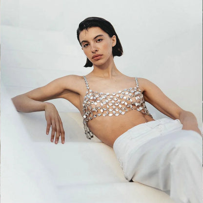 Y2K-inspired prismatic rhinestone-embellished bodycon crop top with high-refraction crystals, rave performance wear